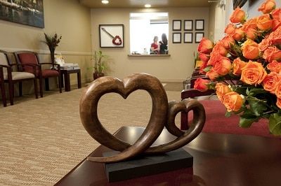 heart shaped wood sculpture in Plano TX cardiology office